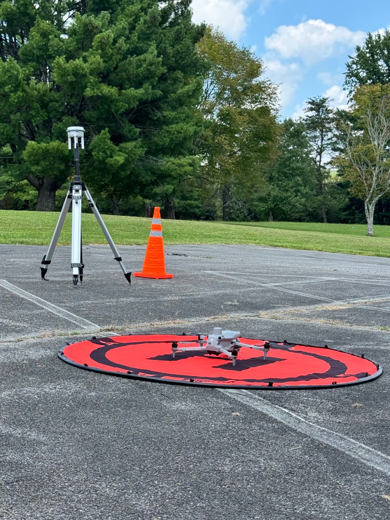 Matrice 4E drone and D-RTK base station set up on a Bristol, Tennessee job site by Tri-Cities Aerial Solutions